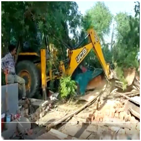 Bulldozer ran on accused's house and shop, destroyed it