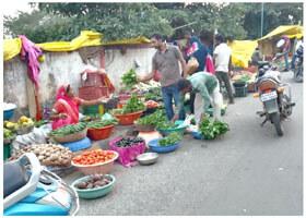 Model road became vegetable market, municipality is waiting for some major accident.