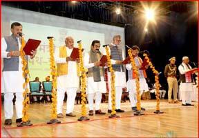 Governor Shri Mangubhai Patel administered oath to the newly appointed ministers.