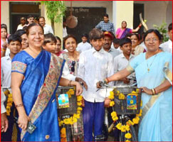 The minister distributed free bicycles to the students