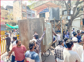 Bulldozer action, encroachment removed from the place of riot and stone pelting