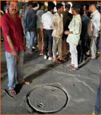 Two corporation workers who went to clean the chamber died.